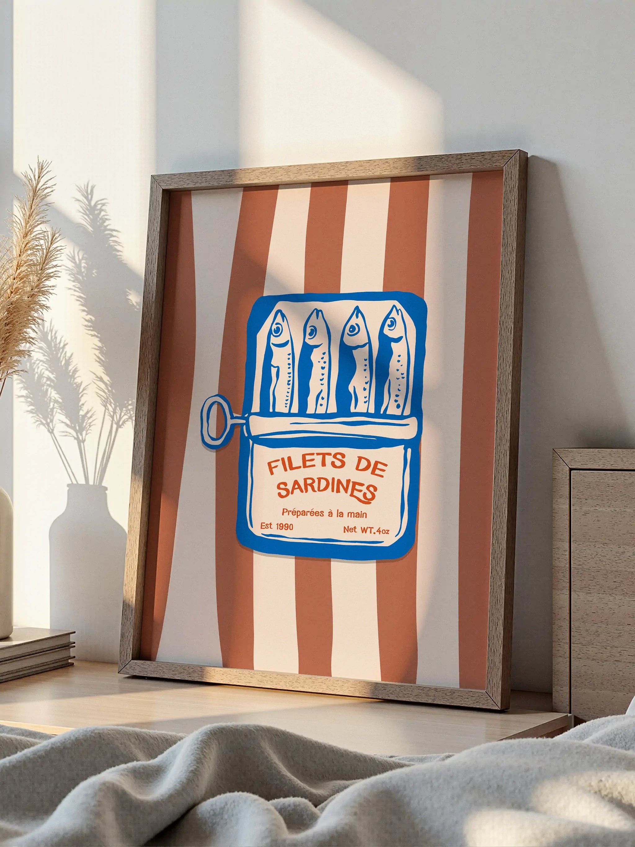 Quirky French sardine tin illustration featuring stylized fish and rustic typography