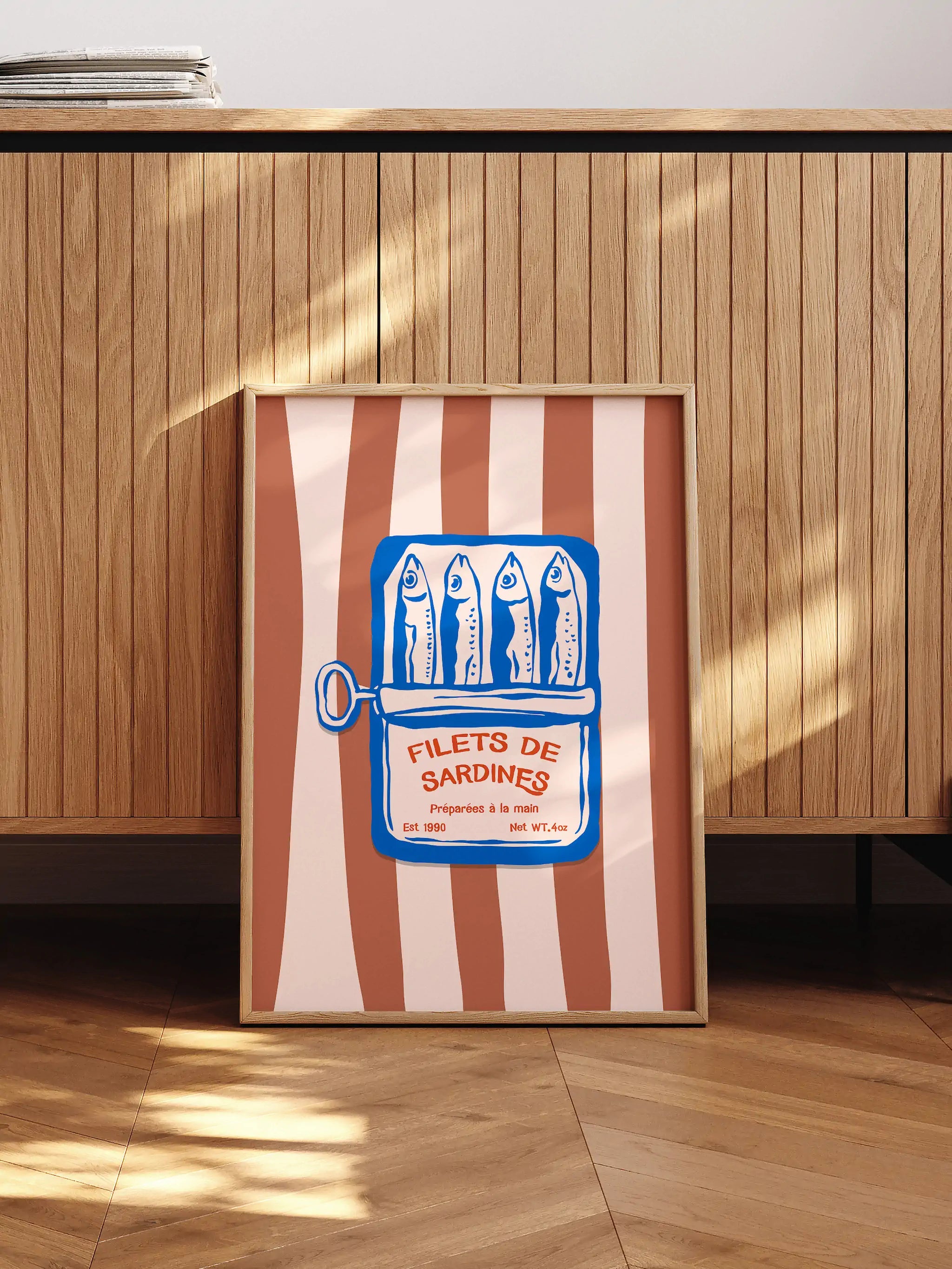 Playful sardine can artwork with bold stripes and a vintage food label design